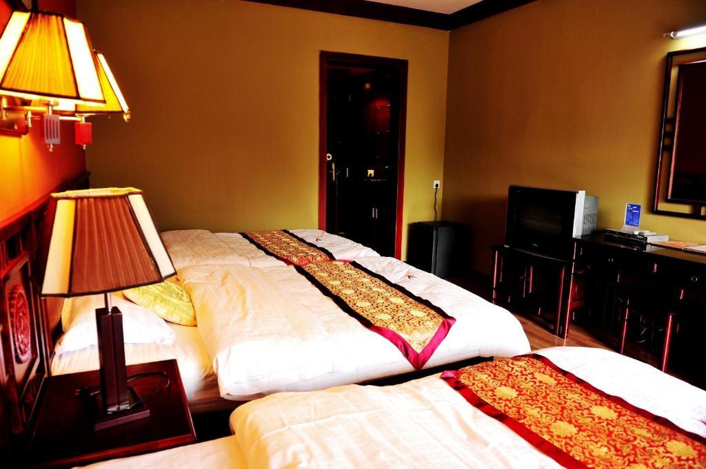 Dragon River Retreat Hotell Yangshuo Rom bilde